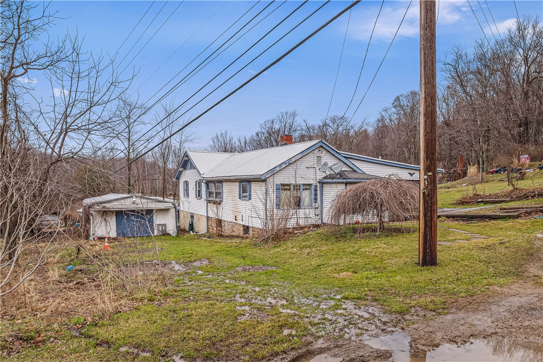 Exterior of 497 Three Mile Hill, Mount Pleasant, PA 15666